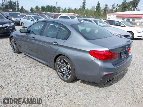 2018 BMW 5 Series 540i z VIN WBAJE5C54JG917877, wystawiony jako IAAI lot #42235433 z przebiegiem 103 375 mil mil oraz . Historia ofert i sprzedaży dostępna na DreamBid. Obrazek 3.