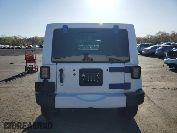 2012 Jeep Wrangler Unlimited Altitude with VIN 1C4HJWEG4CL285314, listed as a Copart auction lot 54494955 with 137,011 mi miles and Salvage title. Bid and sale history available at DreamBid. Image 6.