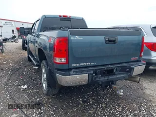 2013 GMC Sierra 2500HD SLT with VIN 1GT121E82DF189658, listed as a IAAI auction lot 42080921 with 160,616 mi miles and . Bid and sale history available at DreamBid. Image 3.