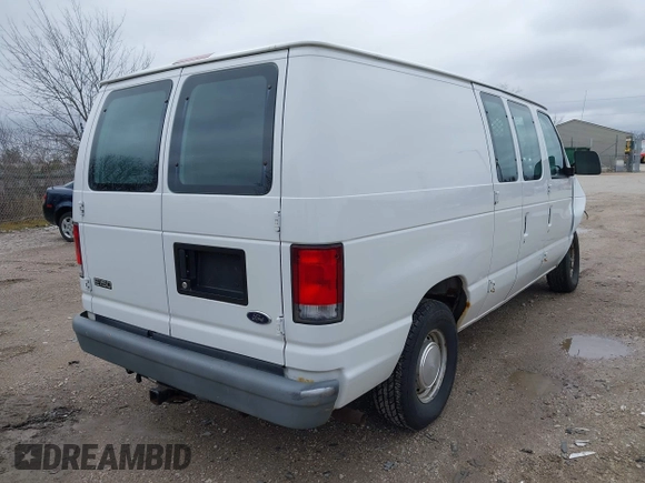 2000 Ford Econoline Cargo with VIN 1FTRE14W2YHB25933, listed as a IAAI auction lot 41912248 with 57,561 mi miles. Bid and sale history available at carsss.com. Image 4.