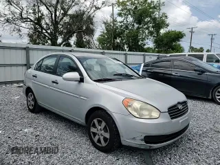 2009 Hyundai Accent Auto GLS z VIN KMHCN46C19U373167, wystawiony jako Copart lot #60026445 z przebiegiem 94 736 mil mil oraz Szkoda całkowita • Salvage title. Historia ofert i sprzedaży dostępna na DreamBid. Obrazek 14.