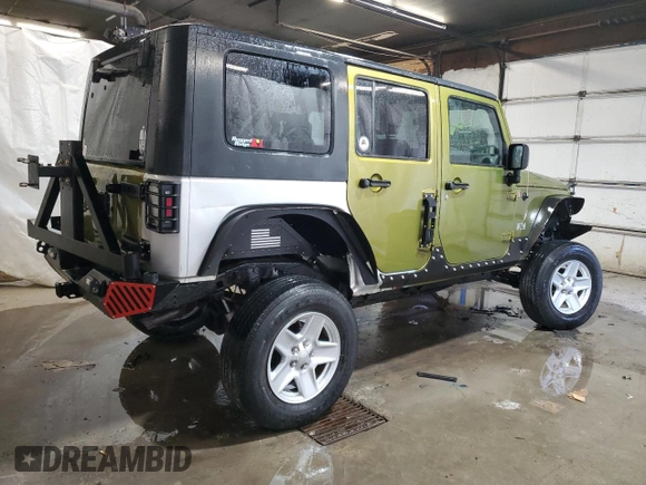 2007 Jeep Wrangler Unlimited X with VIN 1J4GA39187L190061, listed as a Copart auction lot 52420685 with 217,346 mi miles and Salvage Title. Bid and sale history available at DreamBid. Image 3.
