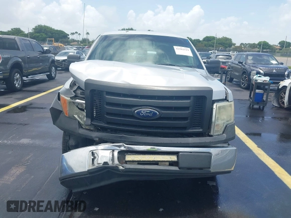 2011 Ford F-150 XL with VIN 1FTEX1CM5BKE08099, listed as a IAAI auction lot 42502519 with 209,489 mi miles and . Bid and sale history available at DreamBid. Image 12.