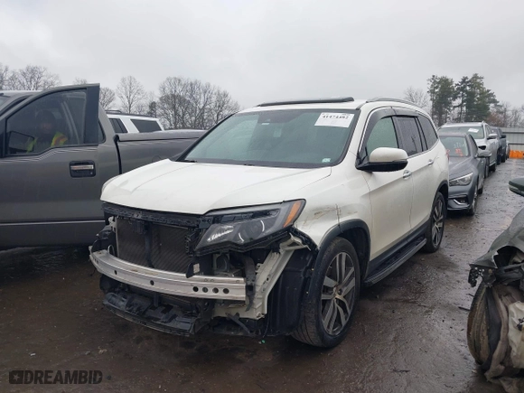 2017 Honda Pilot Touring with VIN 5FNYF5H94HB005653, listed as a IAAI auction lot 41474482 with 157,659 mi miles. Bid and sale history available at carsss.com. Image 20.