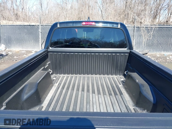 2023 Toyota Tacoma SR with VIN 3TYRX5GN9PT075342, listed as a IAAI auction lot 41652456 with 9,690 mi miles and . Bid and sale history available at DreamBid. Image 12.