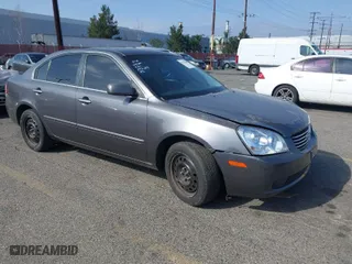 2007 Kia Optima LX with VIN KNAGE123575153609, listed as a IAAI auction lot 41462290 with 217,050 mi miles. Bid and sale history available at carsss.com. Image 1.