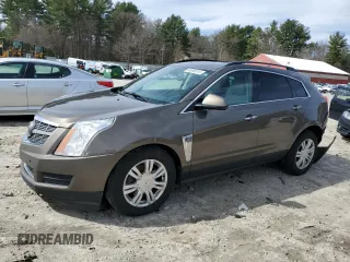 2015 Cadillac SRX z VIN 3GYFNAE38FS508815, wystawiony jako Copart lot #49698015 z przebiegiem 151 059 mil mil oraz Czysty tytuł • Clean title. Historia ofert i sprzedaży dostępna na DreamBid. Obrazek 1.