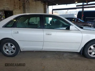 2001 Toyota Avalon XL z VIN 4T1BF28B01U144968, wystawiony jako IAAI lot #41923697 z przebiegiem 184 442 mil mil oraz . Historia ofert i sprzedaży dostępna na DreamBid. Obrazek 13.
