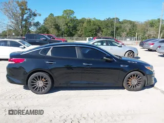 2018 Kia Optima LX with VIN 5XXGT4L3XJG203237, listed as a IAAI auction lot 40631696 with 157,012 mi miles and . Bid and sale history available at DreamBid. Image 14.