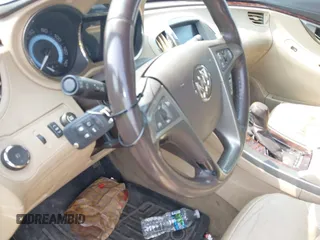 2012 Buick LaCrosse Premium 1 z VIN 1G4GD5E32CF113903, wystawiony jako IAAI lot #42454096 z przebiegiem 133 803 mil mil oraz . Historia ofert i sprzedaży dostępna na DreamBid. Obrazek 11.