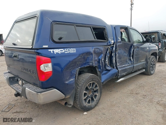 2014 Toyota Tundra 4WD Truck SR with VIN 5TFUY5F1XEX352184, listed as a IAAI auction lot 40732632 with 107,262 mi miles. Bid and sale history available at carsss.com. Image 4.
