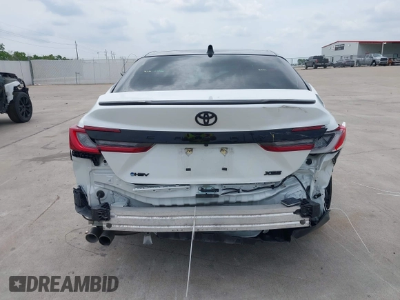 2025 Toyota Camry LE z VIN 4T1DAACK2SU016483, wystawiony jako IAAI lot #42123233 z przebiegiem 19 686 mil mil oraz . Historia ofert i sprzedaży dostępna na DreamBid. Obrazek 17.