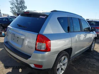 2011 Jeep Compass with VIN 1J4NT1FA4BD139153, listed as a IAAI auction lot 41665481 with 164,412 mi miles. Bid and sale history available at carsss.com. Image 4.