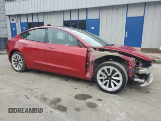 2023 Tesla Model 3 with VIN 5YJ3E1EA6PF437390, listed as a Copart auction lot 62825135 with 115,121 mi miles and Clean title. Bid and sale history available at DreamBid. Image 4.