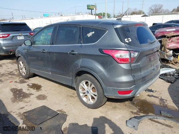 2017 Ford Escape SE with VIN 1FMCU0GD0HUC09474, listed as a IAAI auction lot 41561577 with 69,906 mi miles. Bid and sale history available at carsss.com. Image 3.