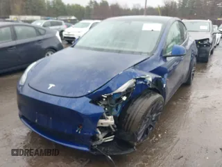 2021 Tesla Model Y Performance with VIN 5YJYGDEF5MF257262, listed as a IAAI auction lot 41721311 with 31,329 mi miles and . Bid and sale history available at DreamBid. Image 2.