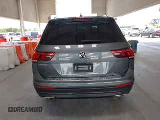 2021 Volkswagen Tiguan S z VIN 3VV1B7AX0MM030915, wystawiony jako IAAI lot #42198262 z przebiegiem 47 500 mil mil oraz . Historia ofert i sprzedaży dostępna na DreamBid. Obrazek 16.