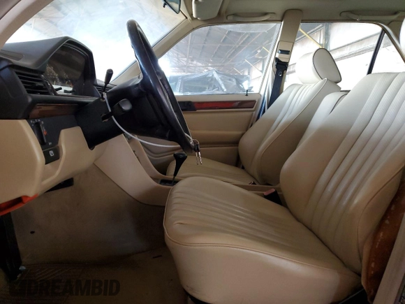 1990 Mercedes-Benz 300 with VIN WDBEA26D3LB134095, listed as a Copart auction lot 86105544 with 143,785 mi miles and Clean Title. Bid and sale history available at DreamBid. Image 7.