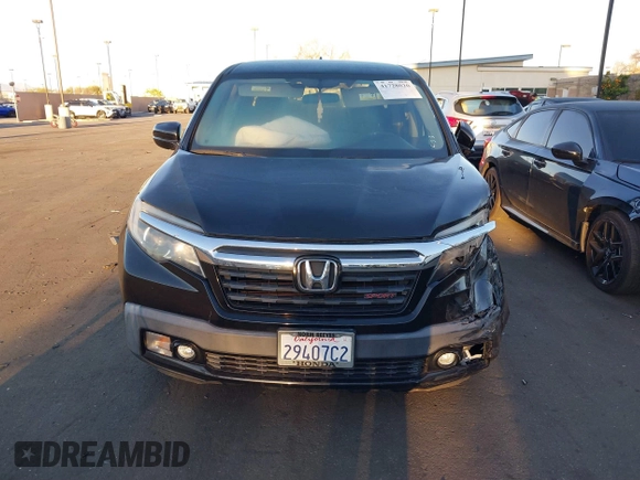 2017 Honda Ridgeline Sport with VIN 5FPYK2F19HB002939, listed as a IAAI auction lot 41728020 with 94,322 mi miles and . Bid and sale history available at DreamBid. Image 13.