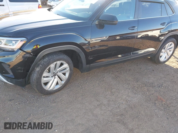 2021 Volkswagen Atlas SE with VIN 1V2WE2CA2MC221789, listed as a IAAI auction lot 41308009 with 53,627 mi miles and . Bid and sale history available at DreamBid. Image 6.