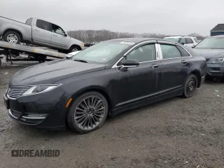 2015 Lincoln MKZ z VIN 3LN6L2JK9FR616314, wystawiony jako Copart lot #51534525 z przebiegiem 130 092 mil mil oraz Czysty tytuł • Clean title. Historia ofert i sprzedaży dostępna na DreamBid. Obrazek 1.