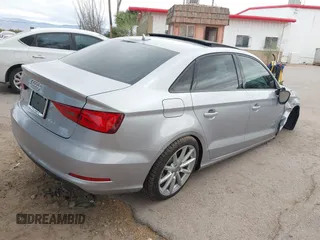 2016 Audi A3 1.8T Premium with VIN WAUA7GFF2G1017615, listed as a IAAI auction lot 41725731 with 70,332 mi miles. Bid and sale history available at carsss.com. Image 4.