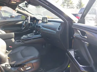 2018 Mazda CX-9 Grand Touring with VIN JM3TCBDYXJ0208962, listed as a IAAI auction lot 42629720 with 123,929 mi miles and . Bid and sale history available at DreamBid. Image 5.