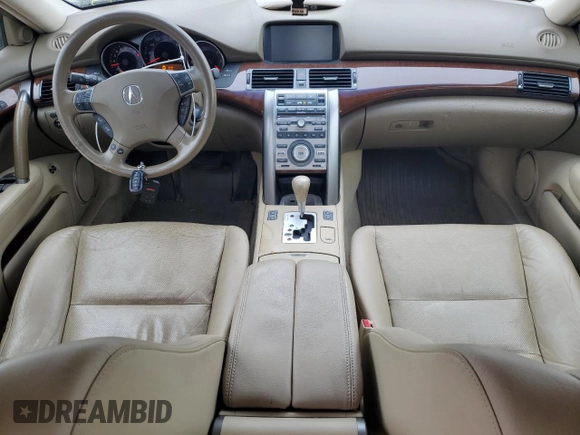 2007 Acura RL Technology z VIN JH4KB16697C002275, wystawiony jako Copart lot #82517284 z przebiegiem 200 857 mil mil oraz Czysty tytuł • Clean title. Historia ofert i sprzedaży dostępna na DreamBid. Obrazek 8.