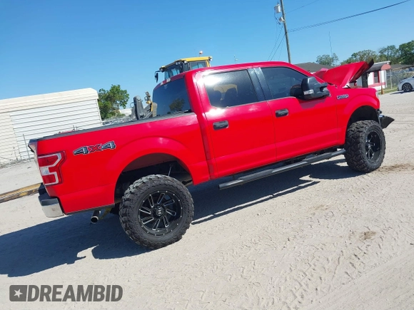 2018 Ford F-150 XL with VIN 1FTEW1E53JFA02130, listed as a IAAI auction lot 41769332 with 186,681 mi miles. Bid and sale history available at carsss.com. Image 4.