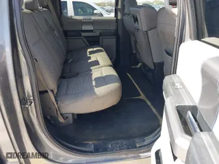 2015 Ford F-150 XLT w/HD Payload Pkg with VIN 1FTFW1EF7FKD04869, listed as a IAAI auction lot 41664736 with 165,784 mi miles. Bid and sale history available at carsss.com. Image 8.