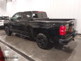 2015 Chevrolet Silverado 1500 LTZ with VIN 3GCUKSEJ9FG448699, listed as a IAAI auction lot 41372615 with 156,010 mi miles. Bid and sale history available at carsss.com. Image 3.