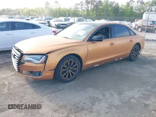 2011 Audi A8 с VIN WAURVAFD3BN013482, выставлен на аукционе IAAI как лот 42109455 с пробегом 179 818 миль миль и . История ставок и продаж доступна на DreamBid. Изображение 2.