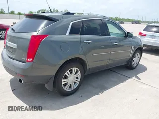 2013 Cadillac SRX Luxury Collection z VIN 3GYFNCE39DS542125, wystawiony jako IAAI lot #42067672 z przebiegiem 158 013 mil mil oraz . Historia ofert i sprzedaży dostępna na DreamBid. Obrazek 4.