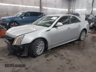 2012 Cadillac CTS with VIN 1G6DC5E59C0135916, listed as a IAAI auction lot 41504182 with 53,000 mi miles and . Bid and sale history available at DreamBid. Image 2.
