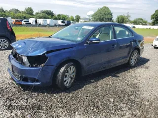 2014 Volkswagen Jetta SE with VIN 3VWD17AJ8EM413915, listed as a Copart auction lot 62325025 with 131,112 mi miles and Salvage title. Bid and sale history available at DreamBid. Image 1.