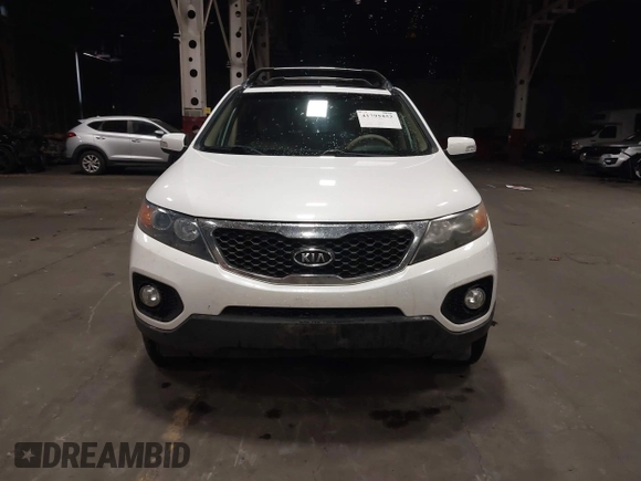 2011 Kia Sorento EX with VIN 5XYKUDA2XBG136475, listed as a IAAI auction lot 41795452 with 218,041 mi miles. Bid and sale history available at carsss.com. Image 6.