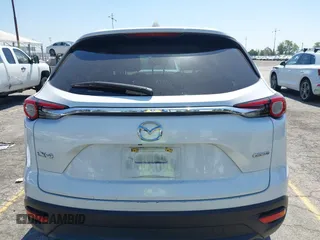 2020 Mazda CX-9 Sport with VIN JM3TCABY1L0406720, listed as a IAAI auction lot 42304144 with 75,887 mi miles and . Bid and sale history available at DreamBid. Image 16.