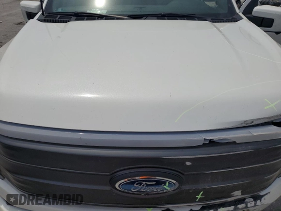 2022 Ford F-150 Lightning Pro with VIN 1FTVW1EL3NWG16146, listed as a Copart auction lot 65322785 with 68,928 mi miles and Salvage title. Bid and sale history available at DreamBid. Image 11.
