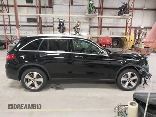 2019 Mercedes-Benz GLC with VIN WDC0G4KB1KV171258, listed as a IAAI auction lot 41895553 with 77,363 mi miles. Bid and sale history available at carsss.com. Image 14.