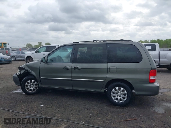 2005 Kia Sedona LX with VIN KNDUP132656734193, listed as a IAAI auction lot 41892342 with 91,768 mi miles. Bid and sale history available at carsss.com. Image 14.