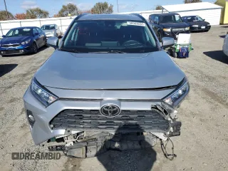 2019 Toyota RAV4 XLE with VIN 2T3W1RFV0KW036705, listed as a Copart auction lot 80983694 with 110,823 mi miles and Salvage Title. Bid and sale history available at carsss.com. Image 5.