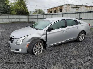 2016 Cadillac XTS Luxury Collection z VIN 2G61N5S31G9194437, wystawiony jako Copart lot #56017485 z przebiegiem 75 979 mil mil oraz Szkody całkowita. Historia ofert i sprzedaży dostępna na DreamBid. Obrazek 1.