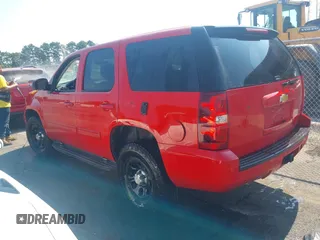 2013 Chevrolet Tahoe Commercial with VIN 1GNSK2E02DR167962, listed as a IAAI auction lot 42554839 with 158,634 mi miles and . Bid and sale history available at DreamBid. Image 3.