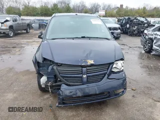 2007 Dodge Grand Caravan SE with VIN 1D4GP24R27B172322, listed as a IAAI auction lot 42005459 with 128,434 mi miles and . Bid and sale history available at DreamBid. Image 13.