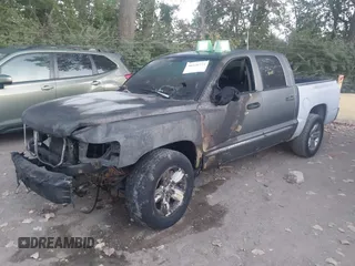 2008 Dodge Dakota Laramie with VIN 1D7HW58N18S603012, listed as a IAAI auction lot 40326773 with 1 mi miles. Bid and sale history available at carsss.com. Image 2.