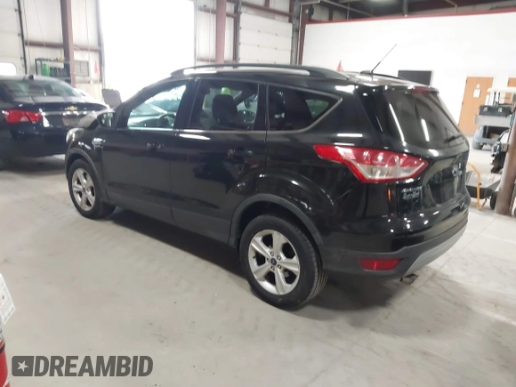 2015 Ford Escape SE with VIN 1FMCU9G97FUA21287, listed as a IAAI auction lot 41990144 with 55,036 mi miles and . Bid and sale history available at DreamBid. Image 3.