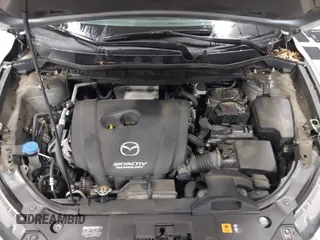 2016 Mazda CX-5 Sport with VIN JM3KE2BY2G0718434, listed as a IAAI auction lot 41961364 with 145,748 mi miles. Bid and sale history available at carsss.com. Image 10.