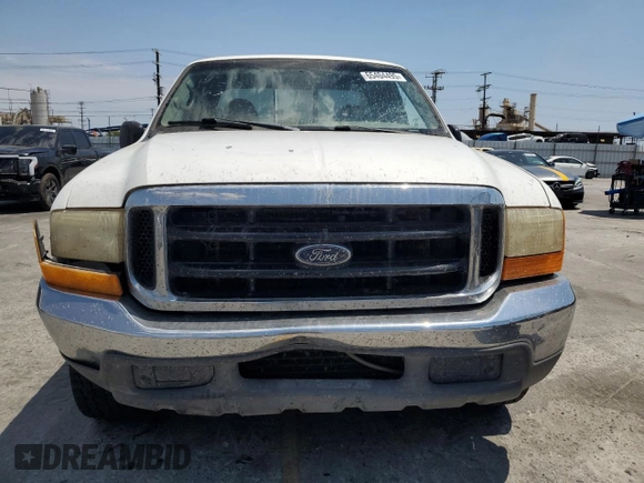 1999 Ford F-250 XL with VIN 1FTNX20L8XEB01923, listed as a Copart auction lot 65404495 with 383,297 mi miles and Salvage title. Bid and sale history available at DreamBid. Image 5.