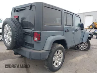 2014 Jeep Wrangler Unlimited Sport with VIN 1C4BJWDG4EL319259, listed as a IAAI auction lot 41494299 with 141,699 mi miles. Bid and sale history available at carsss.com. Image 4.