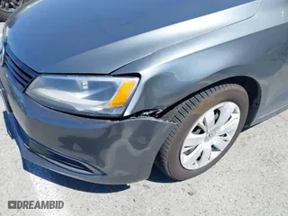2014 Volkswagen Jetta Sedan SE with VIN 3VWD17AJ8EM285143, listed as a IAAI auction lot 41880109 with 123,831 mi miles. Bid and sale history available at carsss.com. Image 6.